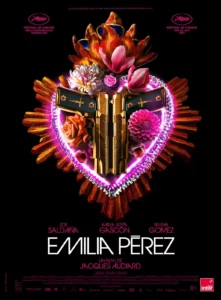 Poster of the film Emilia Pérez: a heart-shaped sacred-heart ornament of flowers and golden pistols on a black background